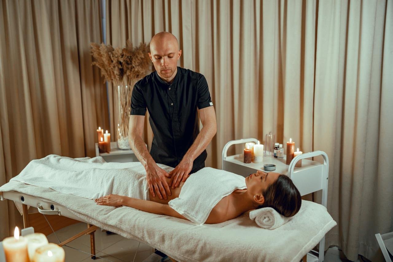 Full body massage session in a calm home spa setting